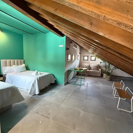 Апартаменты Tuguest Bazan Atico